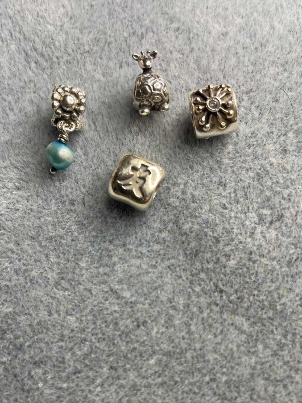 Pandora Giraffe, Chinese Friendship Symbol, Starburst and dangle blue bead LOT